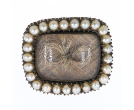 Antique low carat gold hair work brooch w/ seed pearl surround. Measures approx. 1.8 x 1.5cm. Tested to low carat gold. Weigh