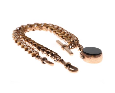 Antique Gold Fancy Link Watch Chain and onyx swivel fob. This piece is stamped on the clasps and on the fob. There is some en