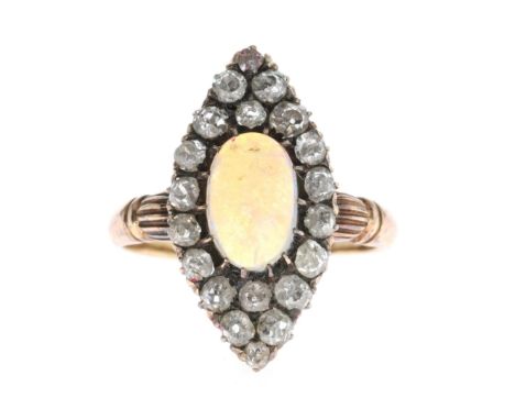 Opal and Old Cut Diamond Gold Navette Ring. Tests 18ct. UK ring size Q. Weighs 4.3g.
