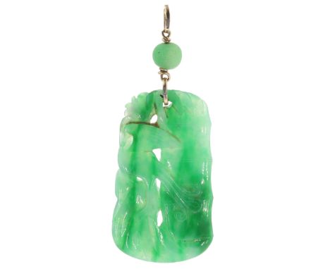 Carved Jade Pendant Depicting a Bird with Yellow Metal Bail. It measures approx 7 x 3.5cm. Weighs in total 18.2g