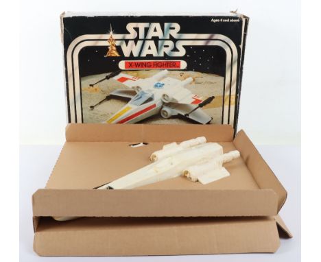Palitoy Star Wars X-Wing Fighter, featuring open wings, lifting cockpit canopy and movable landing skid, with 4 x laser canon