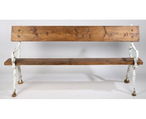 A Victorian cast iron garden bench, with branch effect form ends, later back and seat, 178cm wide