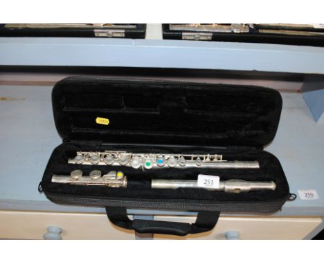 A cased plated flute by SMS Academy
