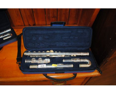 A cased plated flute J.P 11CH