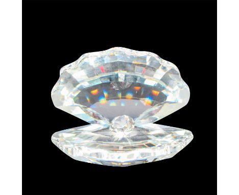 Clam shaped crystal with displayed pearl. 7624 NR 000 003. This item has its original box: 3.25"L x 3.25"W x 2.5"H. Dimension