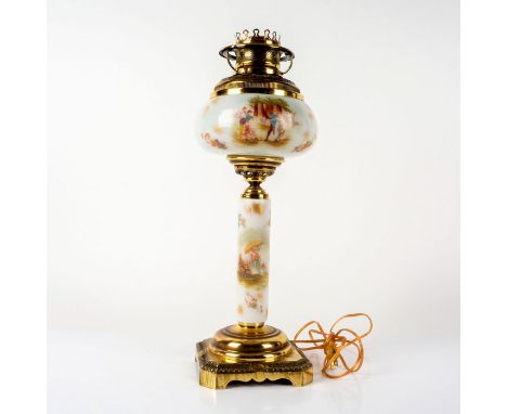 A charming glass lamp depicting children, couples dancing, and cherubs. Accented gilded sprayed blemishes. 'American Pat Appl