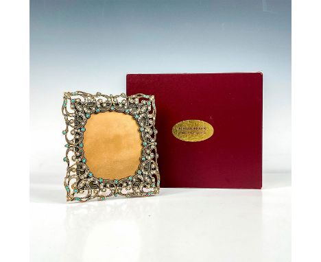 A beautiful museum gold plated frame adorned with turquoise and crystals. Edgar Berebi impressed plaque on the back. Frame si