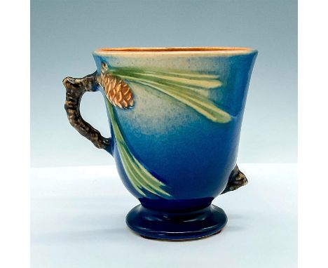 This beautiful coffee cup features the iconic Pinecone pattern in a beautiful shade of blue. Crafted from high-quality cerami