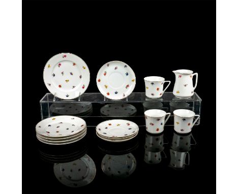 White porcelain decorated with delicate flowers and gold rim. Union K backstamp.Five sandwich plates 7" diameter, three teacu