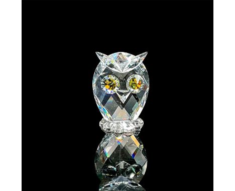Dazzling cut crystal figure of a small owl with blue/green crystal eyes. Swarovski etched mark. Item 10014. Issued: 20th c.Di