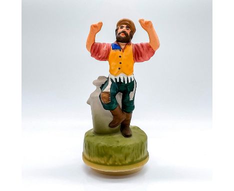 A vintage ceramic figure of Chadwick-Miller on a rotating Sankyo base. Melody plays 'If I were a Rich Man'. C.M.I. Boston bac