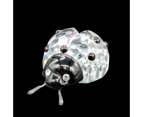 Crystal ladybug with black head and antennaes. 7604 NR 000 001. This item has its original box: 3.25"L x 3.25"W x 2.5"H. Dime