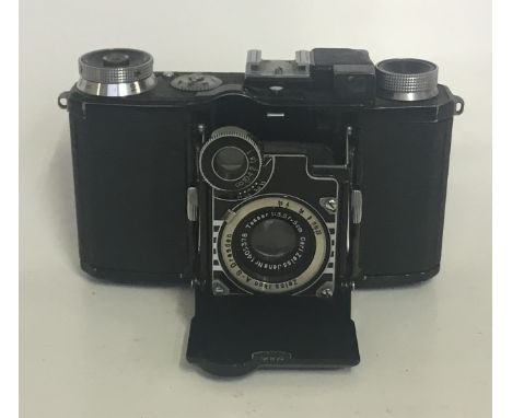 Zeiss Ikon Super Nettel Camera
Lens: 50mm Tessar
Age of Item: 1935 – 37
