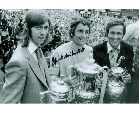 Football, Frank McLintock signed 12x8 black and white photograph pictured as he celebrates with the FA Cup and League Champio