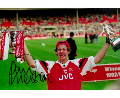 Football Paul Merson signed 12 x 8 inch colour photo holding Cup and Man of Match award. Good condition. All autographs come 