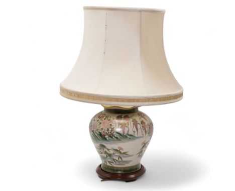 Oriental table lamp, of squat baluster form, decorated with ducks around a pond with blossoming pink flowers on a white groun