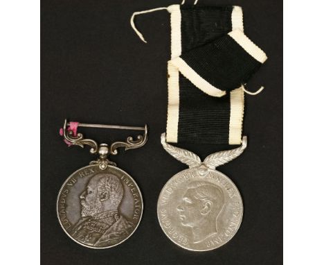 Two Medals: a George Vl Medal,'for service in New Zealand 1939-1945', and anEdward Vll Army Long Service and Good Conduct Med