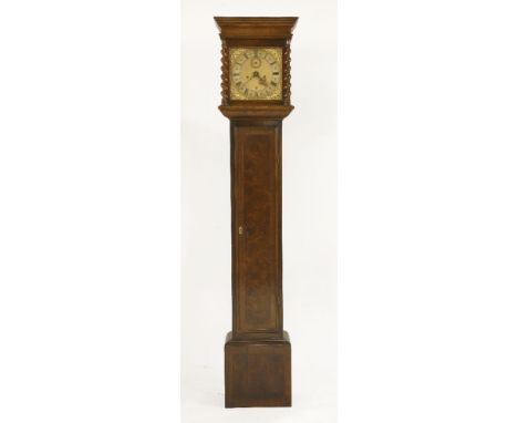 A longcase clock, the modern walnut case with rising hood, the 10¼in brass dial inscribed 'John Wise, London' with five-pilla