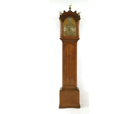 An oak eight-day longcase clock,John Wenham, Dereham, the arched dial signed in the arch over a silvered chapter ring and cen