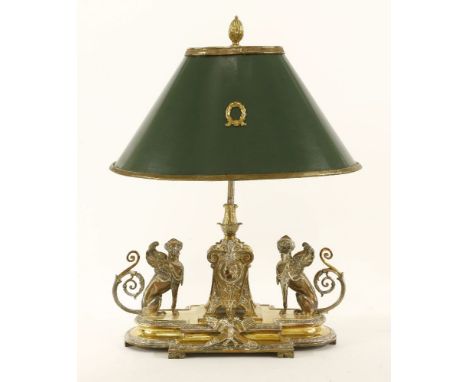 An Elkington & Co. brass desk lamp,19th century, of classical design, with a pair of sphinx dogs and green shade,50cm high