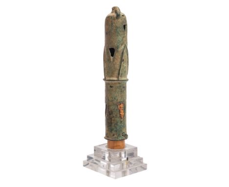 A bronze mace head: of cylindrical form with pierced triangular decoration, 20cm. high.