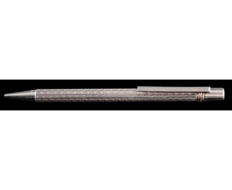 Must de Cartier. A silver pen of engine turned finish signed 'Must de Cartier', dated 1990 and numbered '980127':, together w