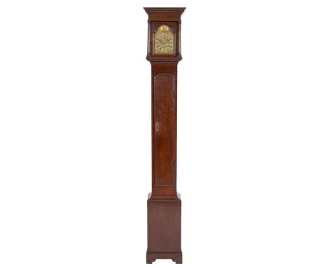 Ainsworth Thwaites, London a slim oak longcase clock: the thirty-hour duration movement having a verge escapement and strikin