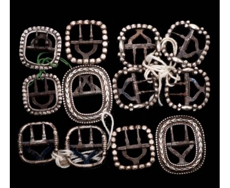 A set of four early 19th century silver garter buckles, maker JW possibly Joseph Willmore, Birmingham, 1816: together with fo