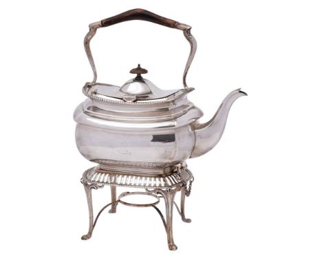 An Edward VII  silver tea kettle on a stand, maker Elkington &amp; Co, Birmingham, 1908: crested, of barge-shaped outline wit