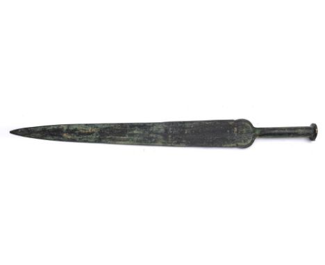A Chinese bronze sword (Jian):  with 47cm. double-edged blade, plain cylindrical grip with flattened pommel.