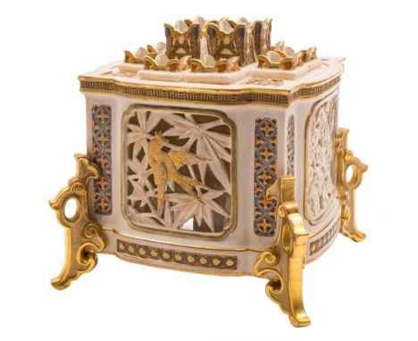 An unusual Royal Worcester Japonesque multiple flower vase: of shaped square form with reticulated sides, decorated in silver