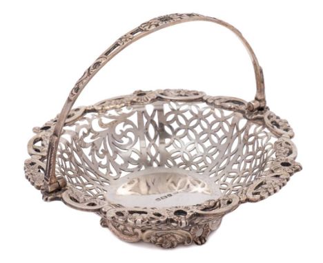 A Victorian silver sweetmeat basket, maker JJ, Sheffield, 1890: of circular outline with pierced foliate border and pierced s