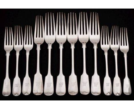 A set of five Edward VII silver Fiddle Pattern table forks, maker Walker &amp; Hall , Sheffield, 1909: initialled,  a near ma