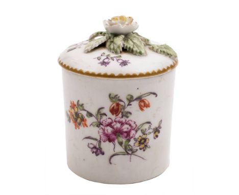 A Derby toilet/pomade pot and cover: of cylindrical form with flower finial, painted in 'Cotton Stem' style with floral spray