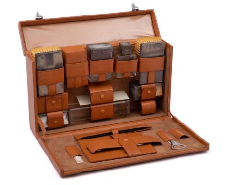 A George VI / Elizabeth II gentleman's toiletry case, maker TP, London, 1949/55: the case fitted with silver backed brushes, 