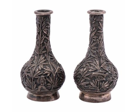 A pair of late 19th century Chinese silver miniature bottles, maker Cumshing, Canton: of ovoid form with slender necks, 5.5cm