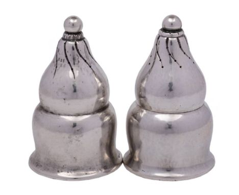 A pair of Georg Jensen silver condiments, stamped marks and bears import marks for Stockwell &amp; Co, London, 1925: of waist