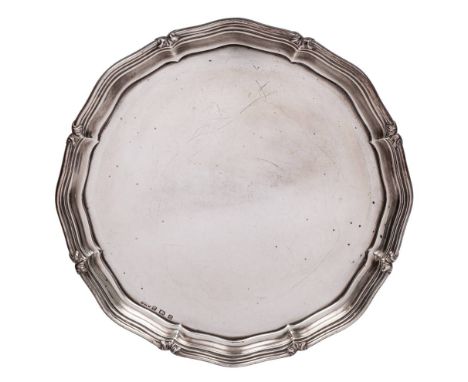 A George V silver salver, maker J Hill &amp; Co, Birmingham, 1931: of plain circular form, with a moulded edge, 30cm diameter