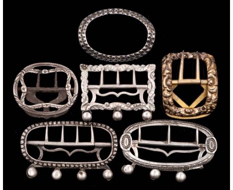 Six assorted silver buckles and garter buckles, various makers and dates: including silver gilt example, (6). 