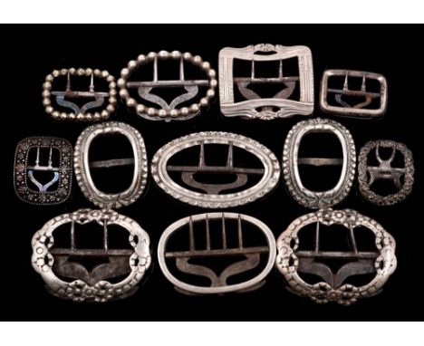 Two pairs of 19th century silver and steel garter buckles: together with eight single silver and steel garter buckles, variou
