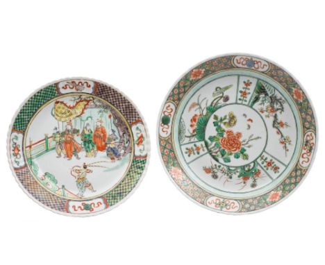 Two Chinese famille verte dishes: in the Kangxi manner, one painted with dignitaries, attendants and soldiers on a terrace, l