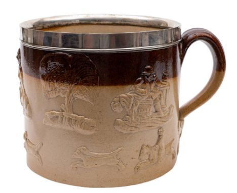 A salt glazed stoneware mug, probably Doulton or James Stiff: of generous proportions with grooved strap handle and leafy ter