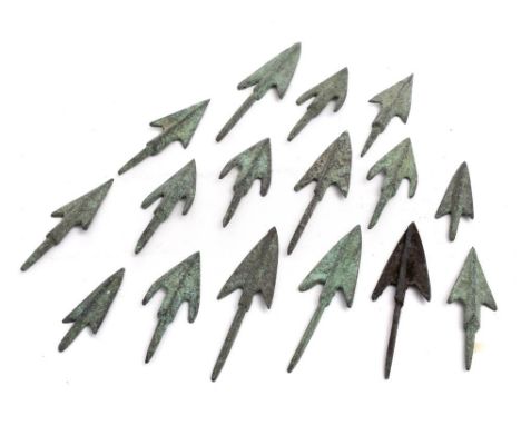 A collection of bronze arrow heads: approx 7.5cm. long 