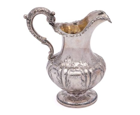 A Victorian silver cream jug, maker Samuel Hayne &amp; Dudley Cater, London, 1865: of squat baluster form, with flowerhead bo