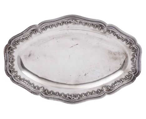 A French silver serving tray, maker Flamant &amp; Fils: of cartouche-shaped outline, with moulded and scalloped border, 50cm.