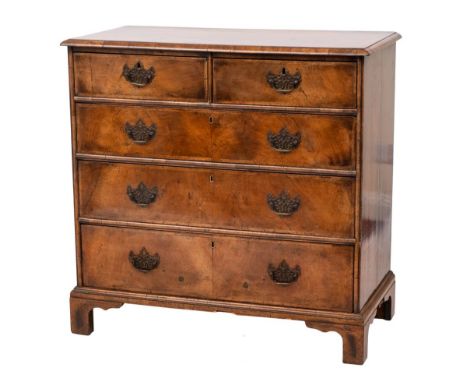 An 18th Century walnut and crossbanded rectangular chest:, the top with a moulded edge, containing two short and three long d