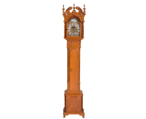 A twentieth century moonphase grandmother clock: the eight-day duration, weight-driven movement striking the hours on a bell,