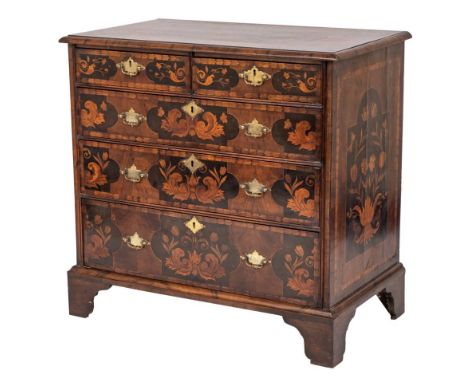 An early 18th Century walnut, banded and floral marquetry rectangular chest:, the moulded top decorated with an oval panel of