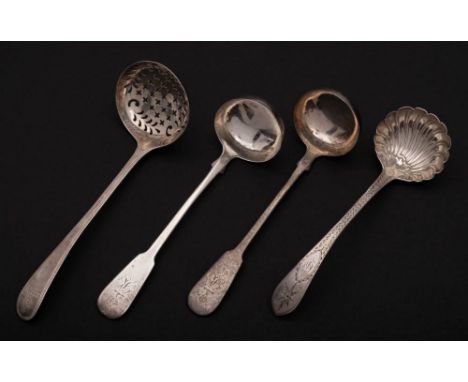 A pair of  George IV Scottish silver Fiddle pattern sauce ladles, maker Adam Elder, Edinburgh, 1828: crested and initialled, 