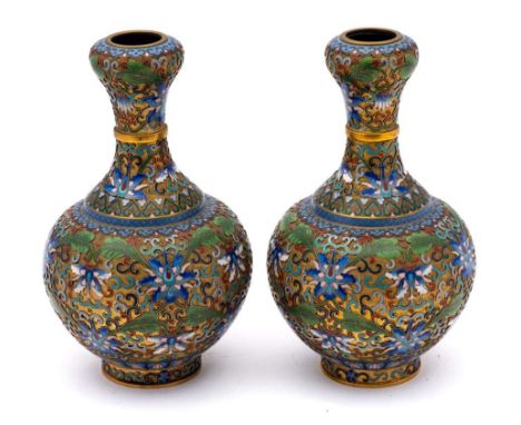 A pair of Chinese champleve enamel garlic-mouth bottle vases: each  decorated with a raised design of peonies, scrollwork and